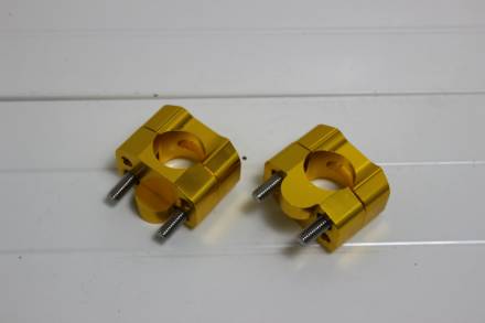 Переходники (стойки) руля 22мм-28мм золотистые