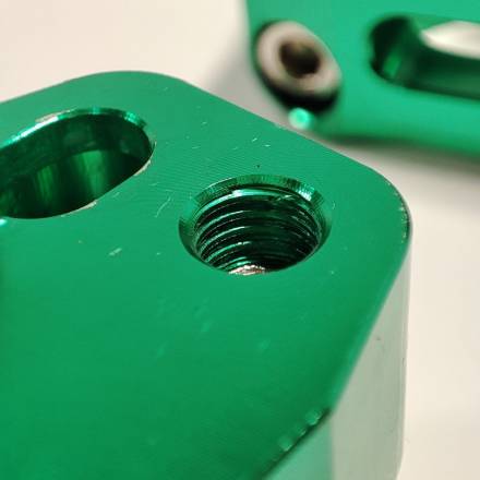 Переходники (стойки) руля 22мм-28мм зеленые